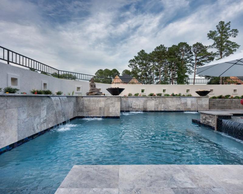 pool side view of pool fountains